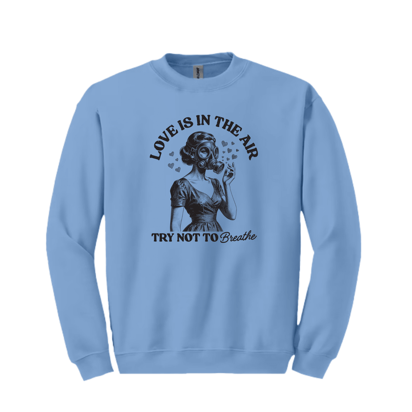 Blue graphic sweatshirt featuring vintage style Love Is In The Air humor design
