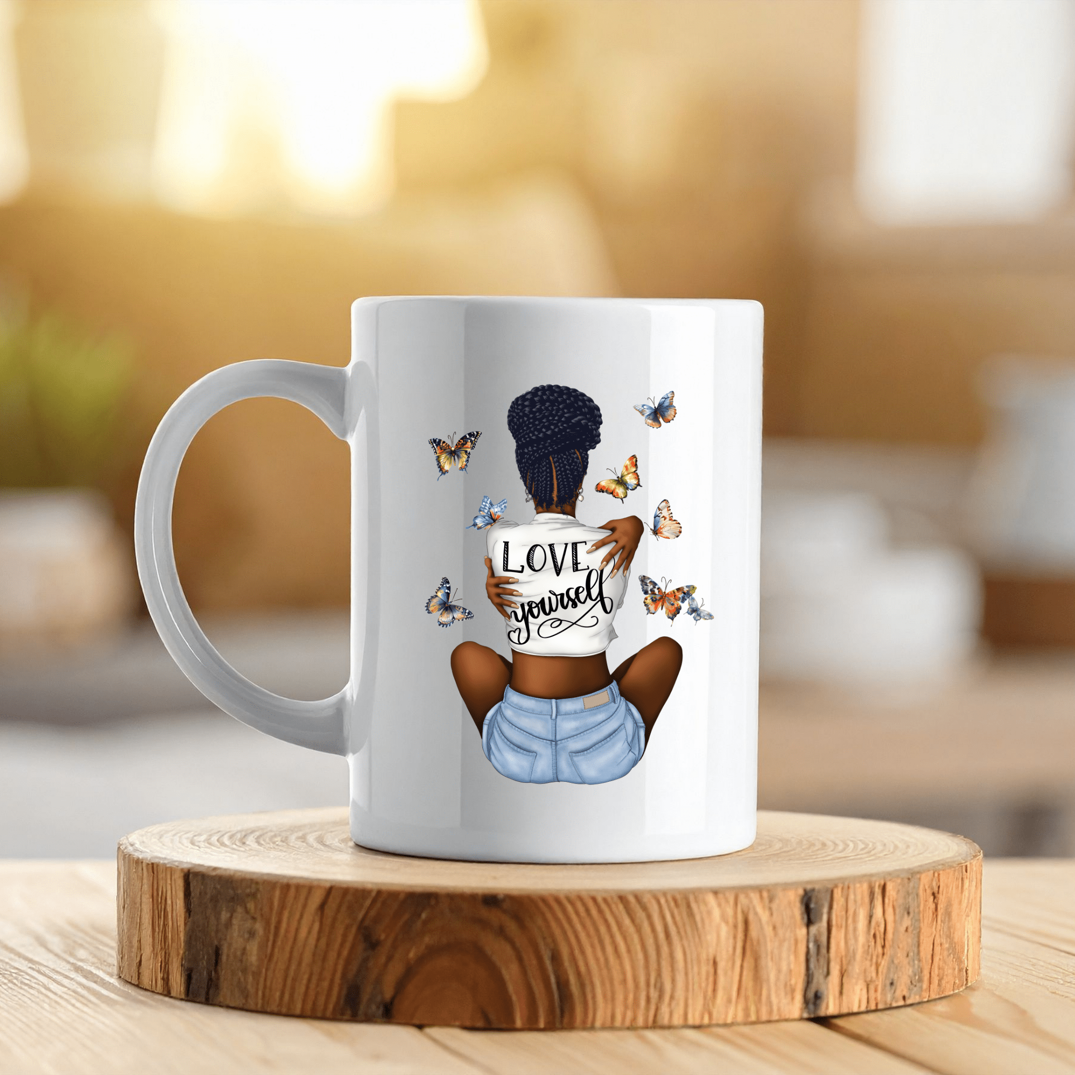 Inspirational coffee mug showing a braided Black woman surrounded by colorful butterflies.