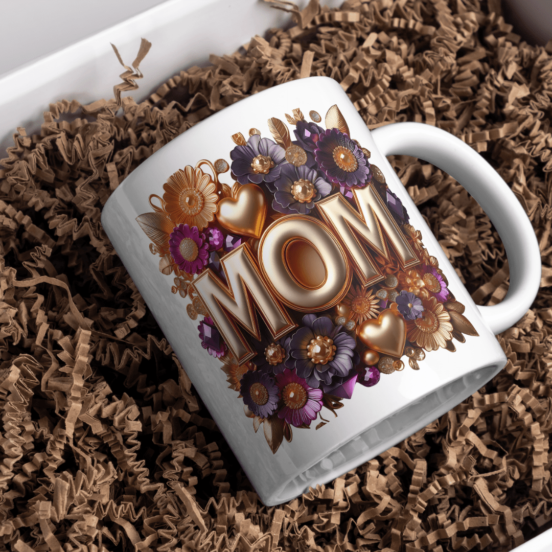 MOM ceramic mug with floral artwork placed inside gift box packaging with decorative filler