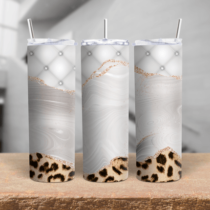 Luxury leopard marble skinny tumbler with rose gold accents, tufted diamond design, and animal print base in 20oz and 30oz.