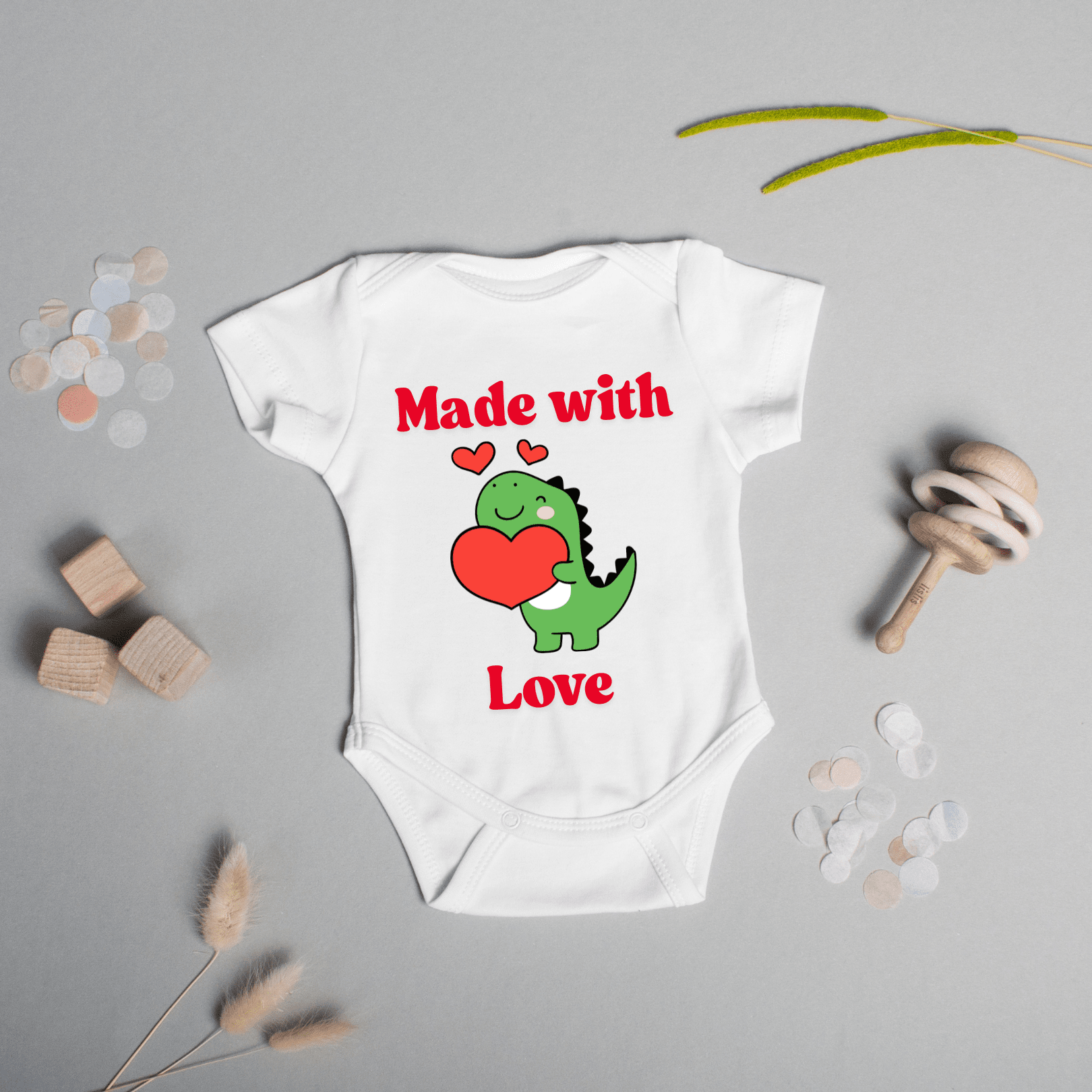 Infant cotton onesie with red lettering and heart design