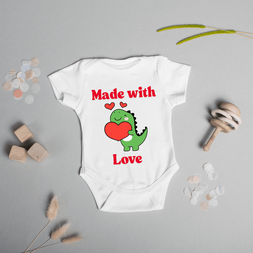 Infant cotton onesie with red lettering and heart design