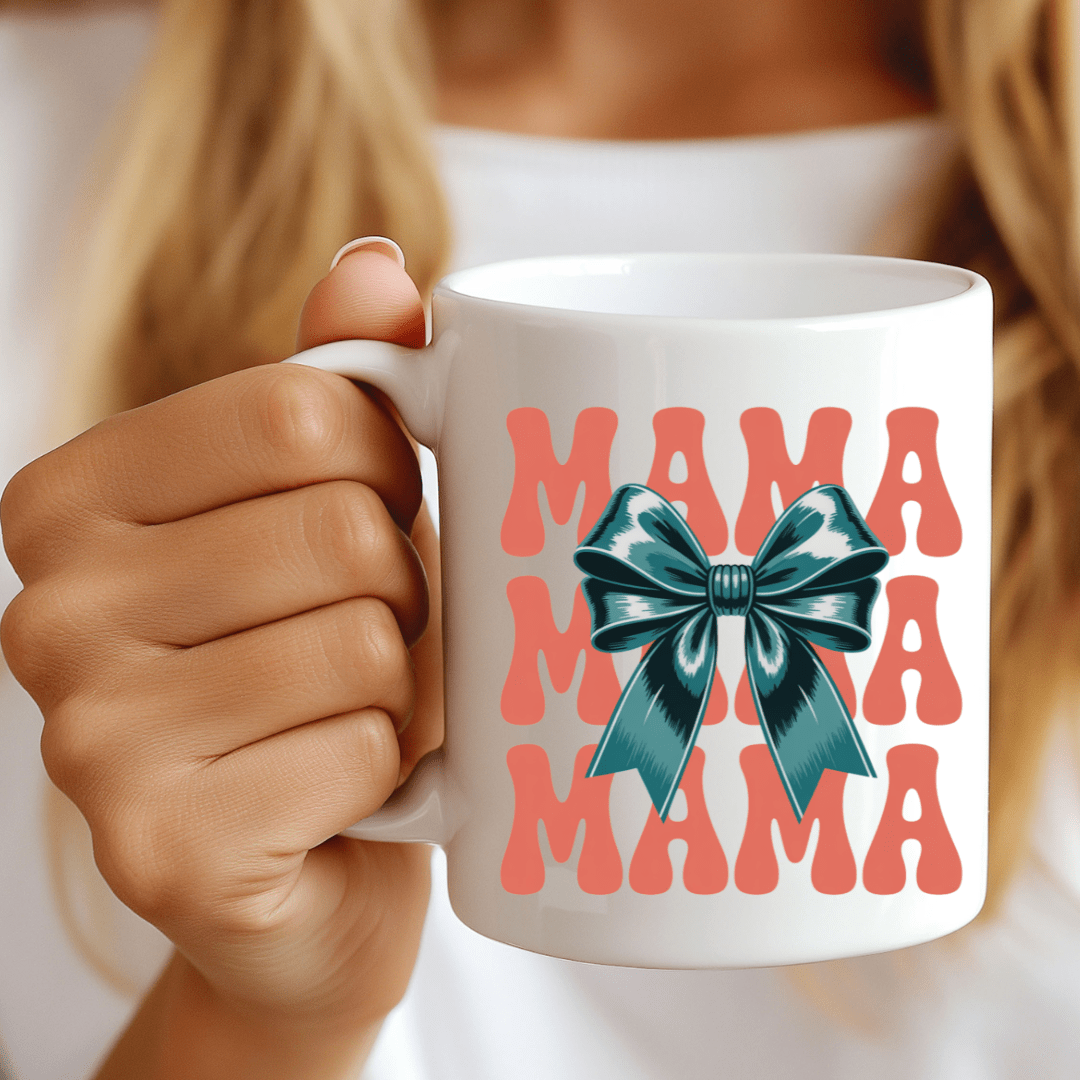 Close up of mama mug with bold typography and bow illustration