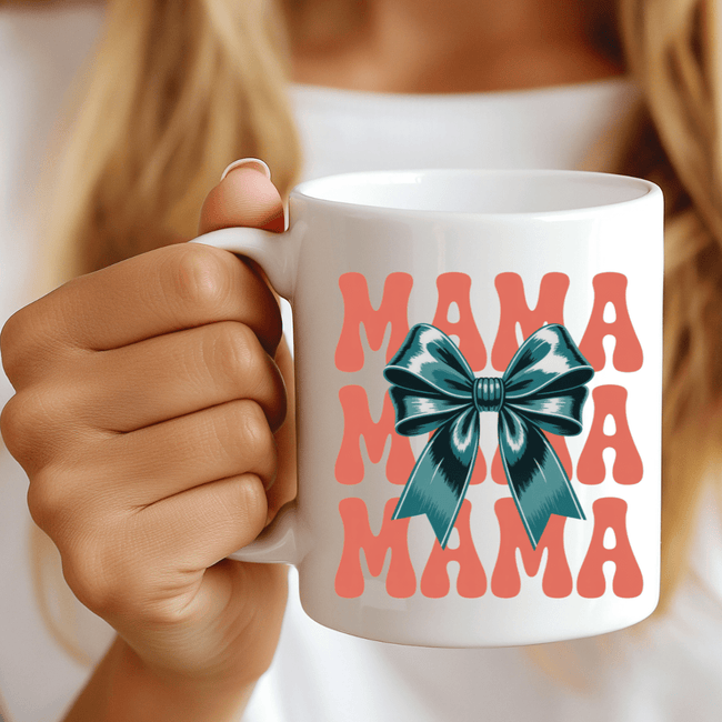 Close up of mama mug with bold typography and bow illustration