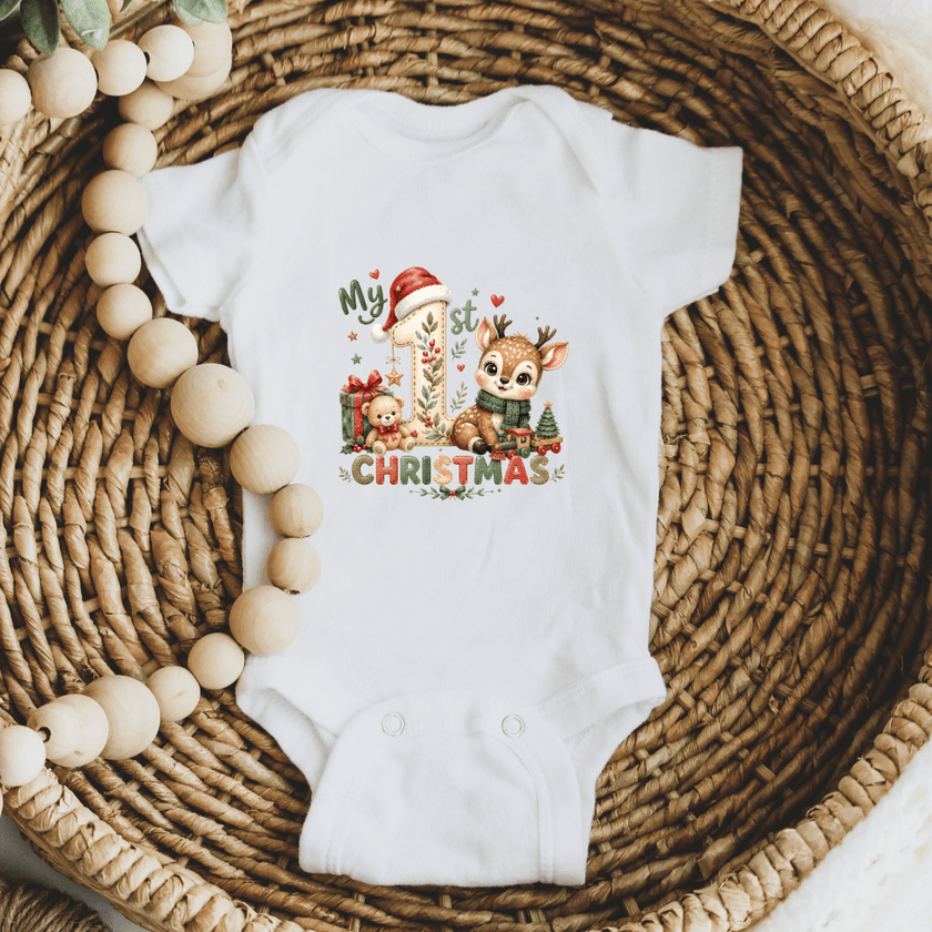 Woodland Christmas baby onesie with cute reindeer and My First Christmas number one holiday design.
