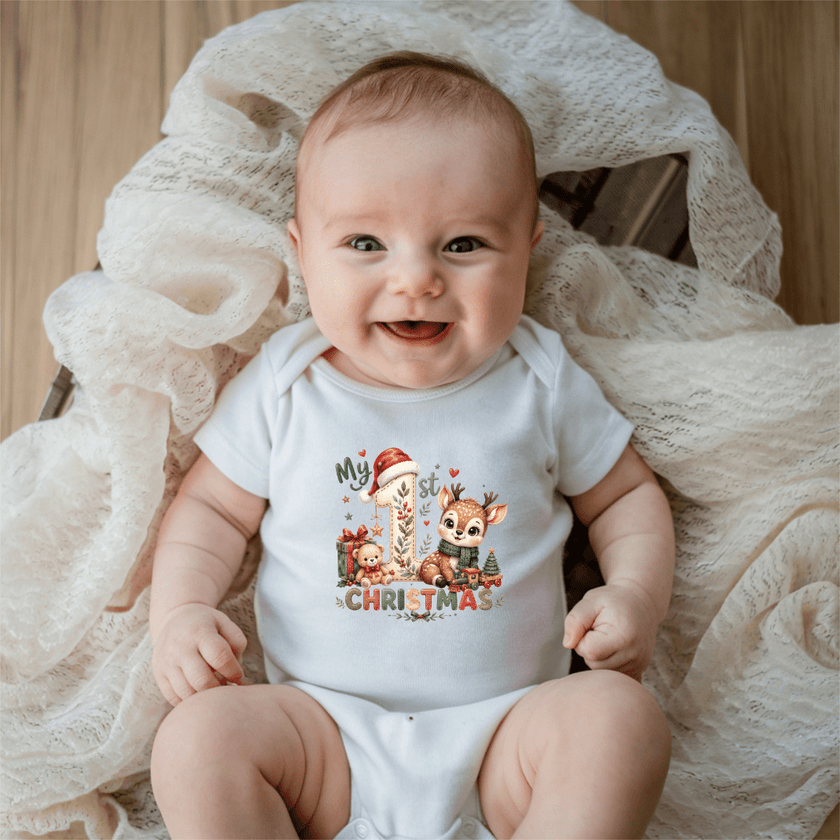 Cute reindeer baby Christmas onesie featuring a festive first Christmas design for babies and infants.
