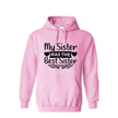 Pink sister hoodie flat lay on white background showing full front heart-framed text