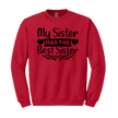 Red sweatshirt with black text and heart graphics on a white background