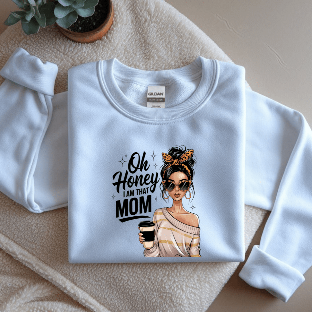 White sweatshirt with a graphic design and text on a beige surface