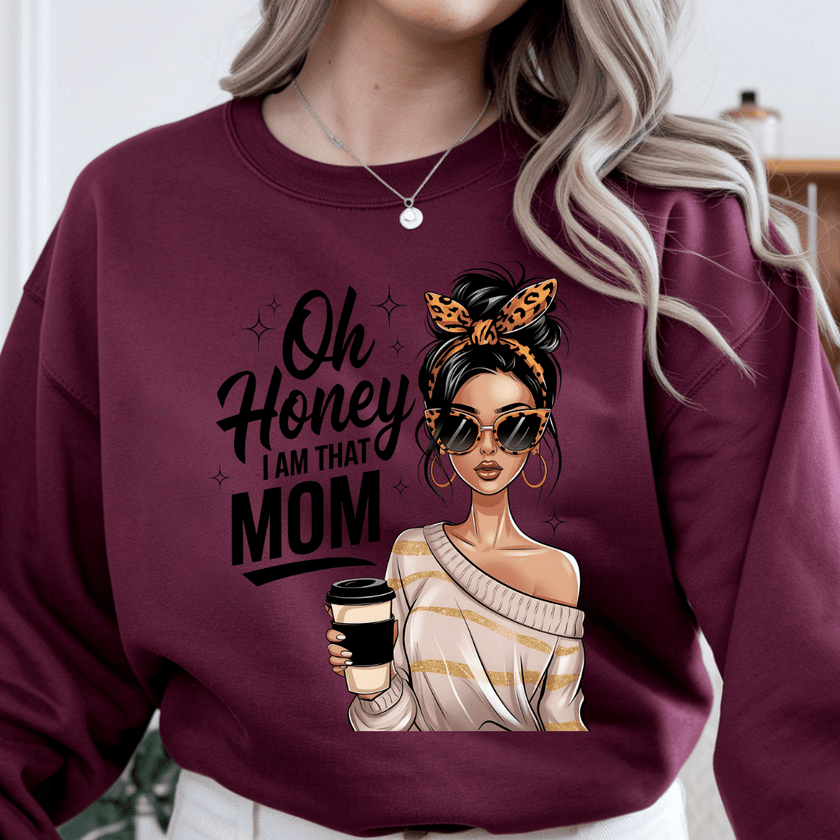 Burgundy crewneck sweatshirt with “Oh Honey I Am That Mom” quote and chic illustrated woman
