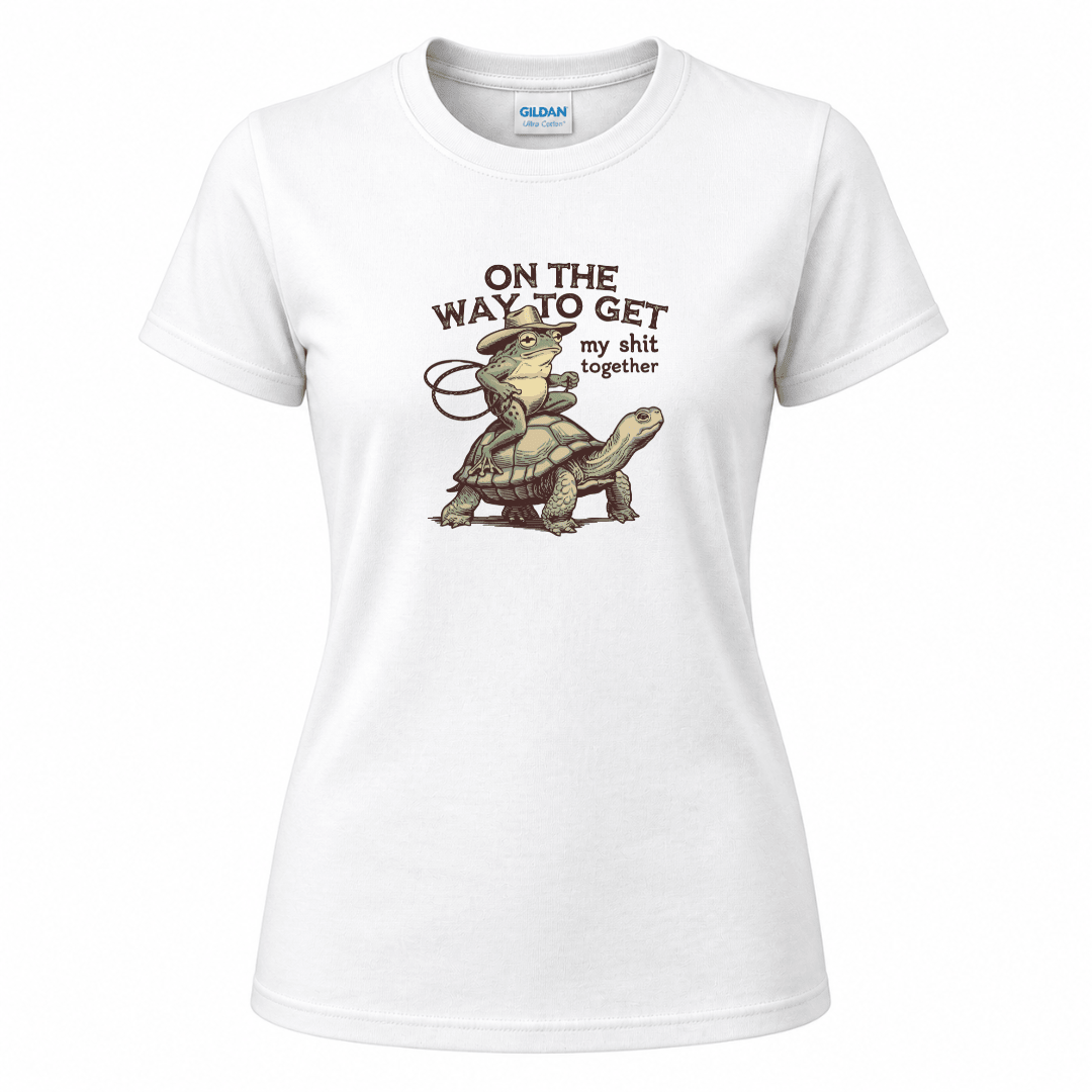 White funny animal shirt with retro frog cowboy illustration and humorous wording