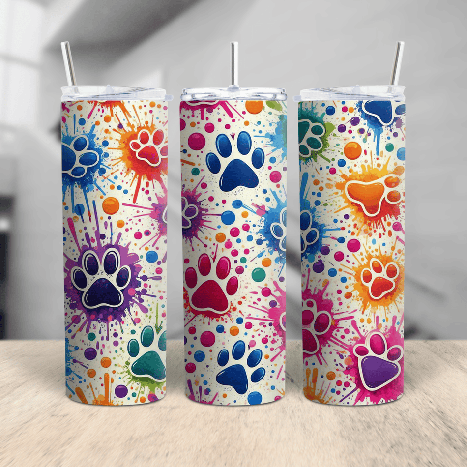 A vibrant stainless steel tumbler featuring colorful watercolor paw prints and splash designs, available in 20oz and 30oz sizes for pet lovers.
