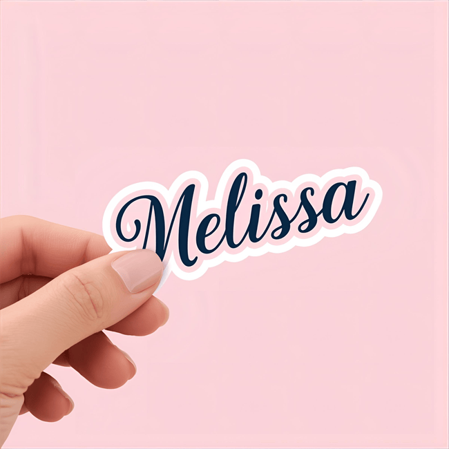 Personalized vinyl name sticker with ‘Melissa’ in elegant cursive font held by hand on pink background.