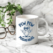Humorous white coffee mug with sarcastic duck illustration and funny quote displayed on marble countertop setting.