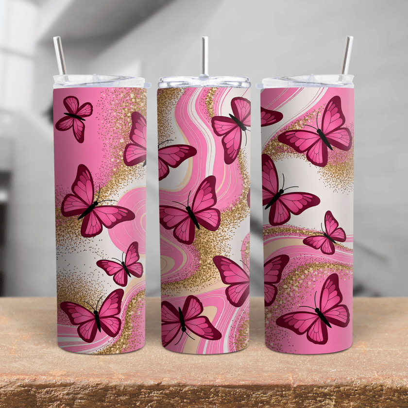 A pink stainless steel glitter tumbler featuring vibrant butterflies and a marble swirl background.