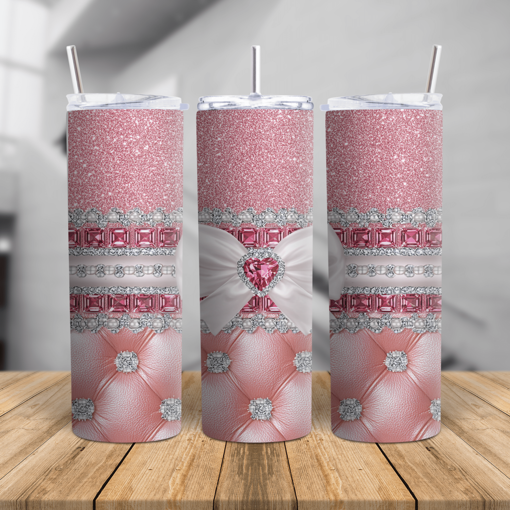 Pink glitter skinny tumbler with white bow, rhinestone heart, pearl accents, and stainless steel design.