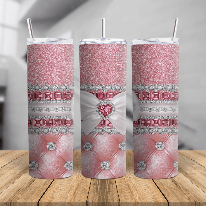 Pink glitter skinny tumbler with white bow, rhinestone heart, pearl accents, and stainless steel design.