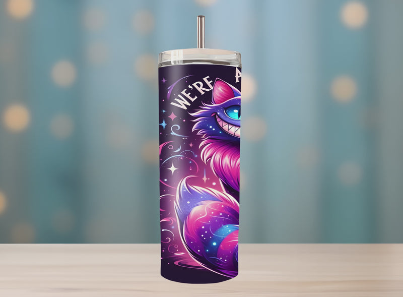 30oz insulated stainless steel tumbler featuring vibrant Wonderland-inspired Cheshire Cat artwork and starry swirl accents