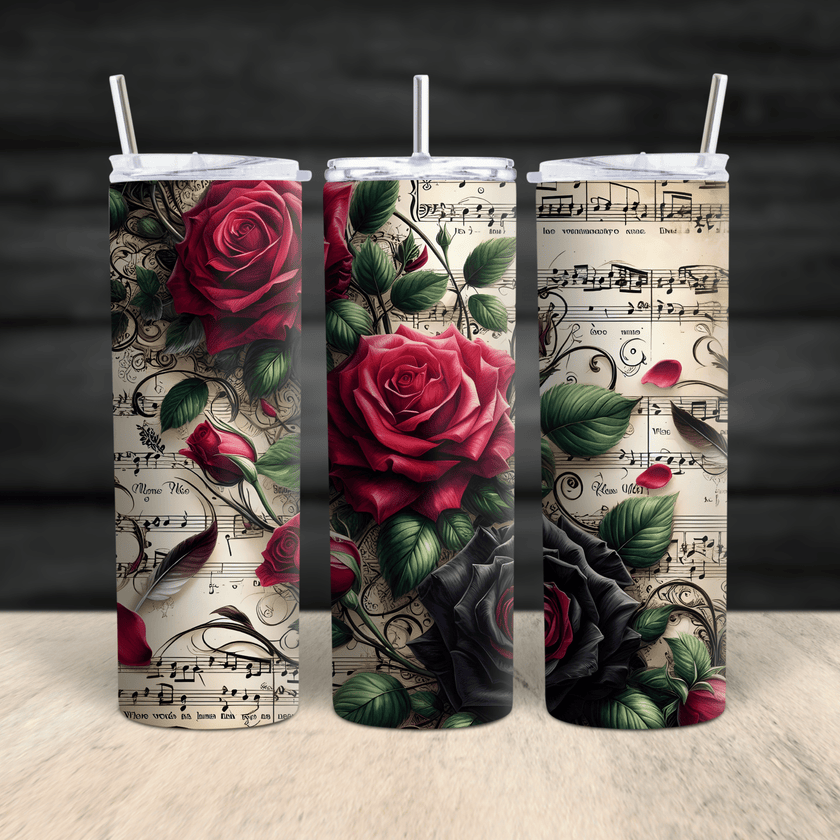 A stainless steel tumbler featuring detailed red and black roses over a vintage music sheet design with floral accents.