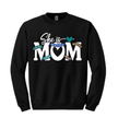 Black crewneck sweater with bold She Is Mom graphic and colorful affirmation words