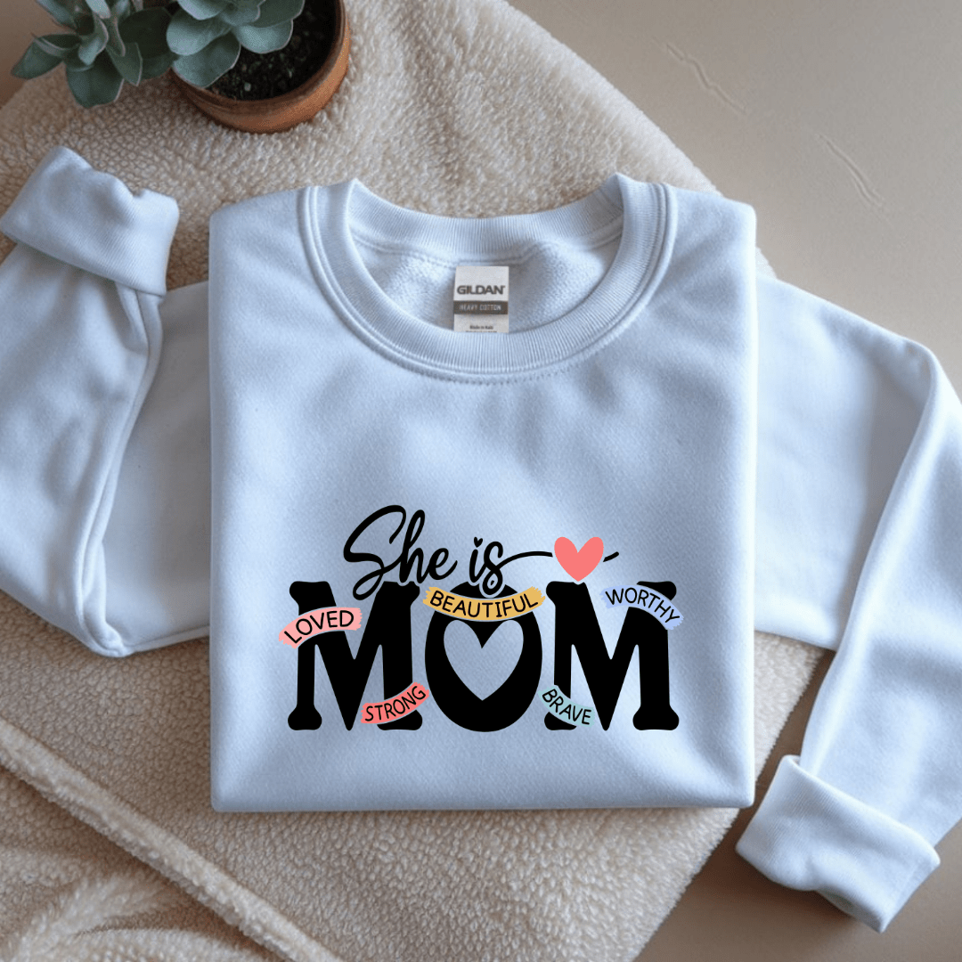 White crewneck sweatshirt with inspirational mom quote design in a clean minimalist style
