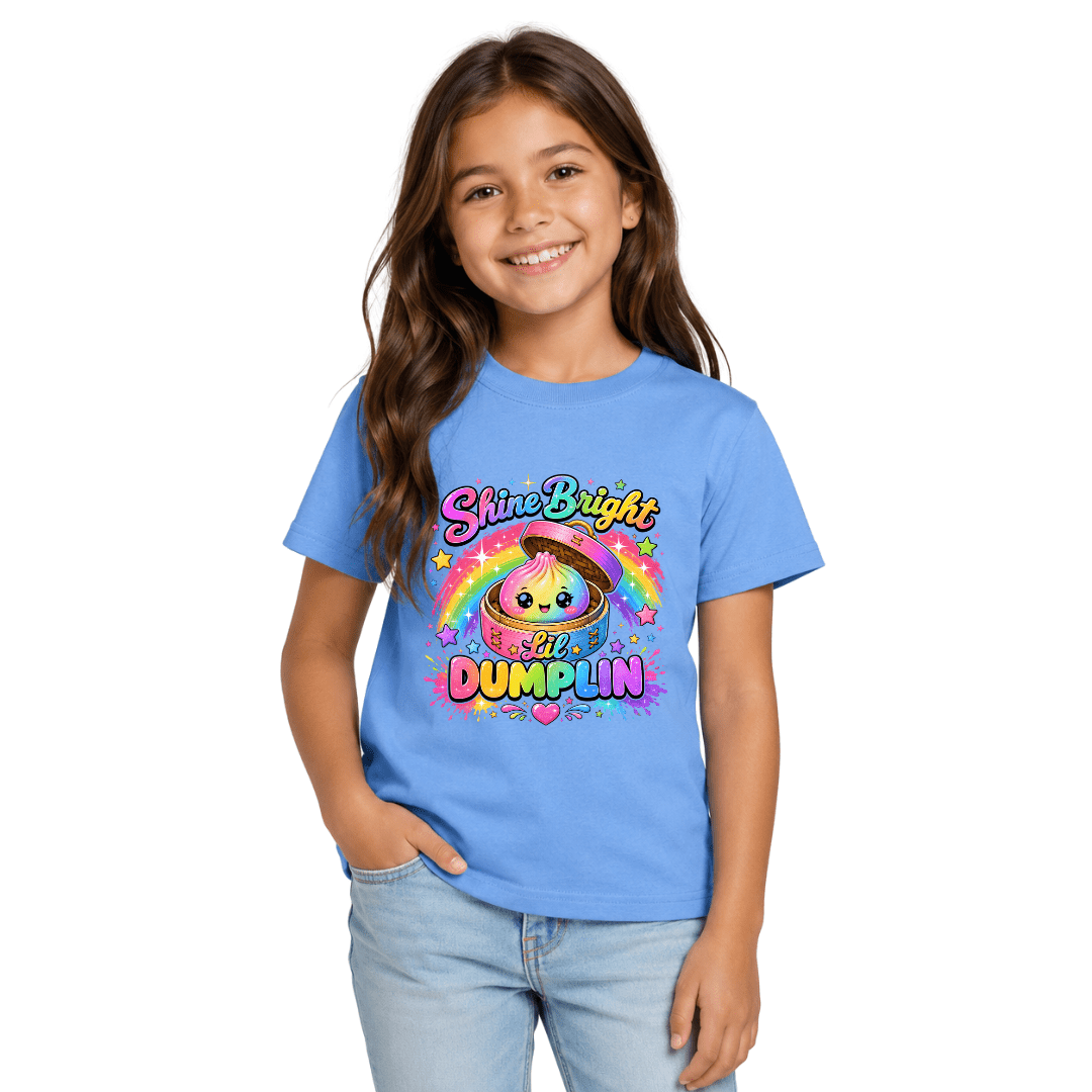 Carolina blue girls youth T shirt featuring the Shine Bright Lil Dumplin rainbow graphic with stars and colourful lettering.