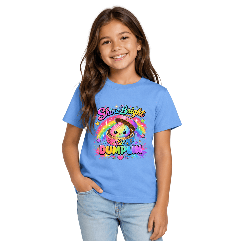 Carolina blue girls youth T shirt featuring the Shine Bright Lil Dumplin rainbow graphic with stars and colourful lettering.
