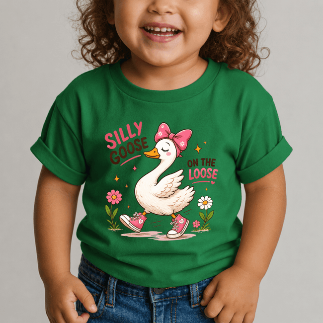 Green youth t shirt with a cute goose illustration, flower details, and playful text for kids casual outfits.