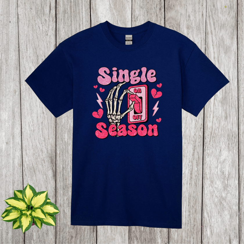 Navy blue shirt displaying funny single season graphic with retro pink glitter design