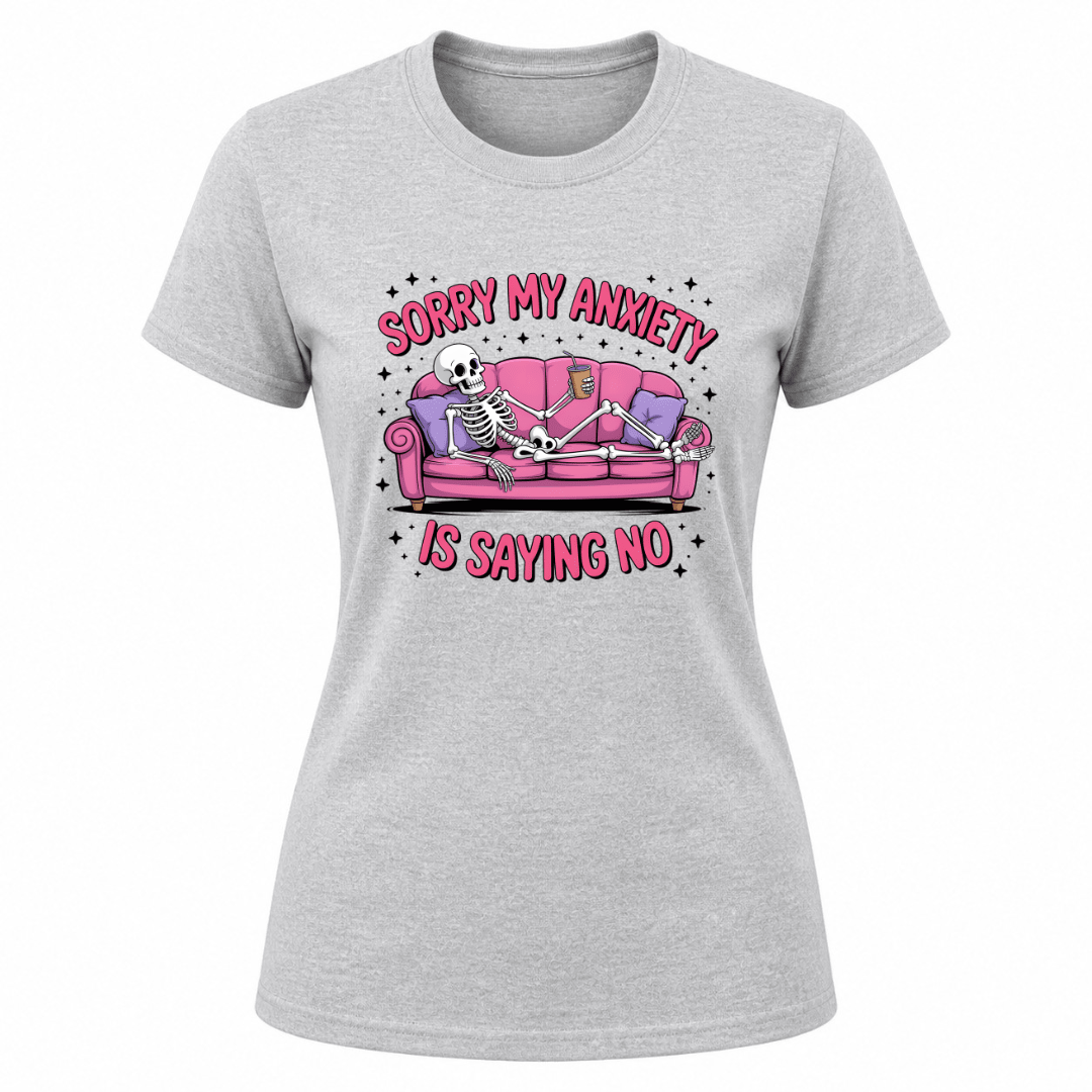Heather grey women’s sarcastic graphic tee with skeleton lounging on pink couch and anxiety humor typography design