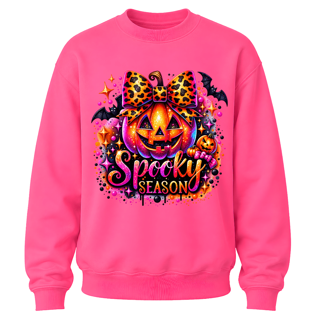Safety Pink youth girls Halloween crewneck featuring a bright jack o lantern, leopard bow and colourful Spooky Season design