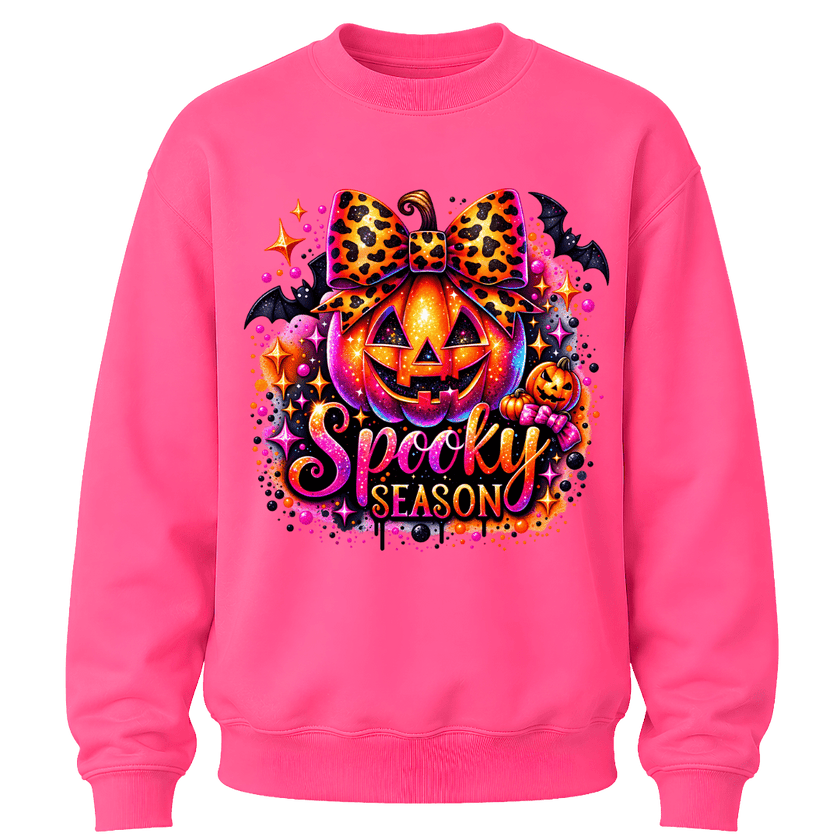 Safety Pink youth girls Halloween crewneck featuring a bright jack o lantern, leopard bow and colourful Spooky Season design
