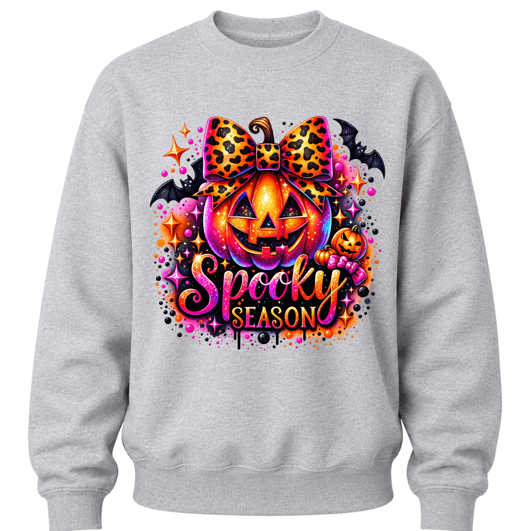 Grey girls Spooky Season sweatshirt with leopard print bow, glowing pumpkin and bright Halloween graphic