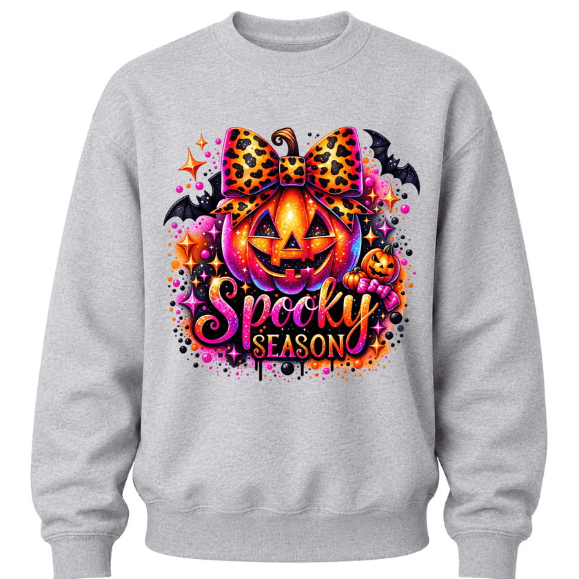 Grey girls Spooky Season sweatshirt with leopard print bow, glowing pumpkin and bright Halloween graphic