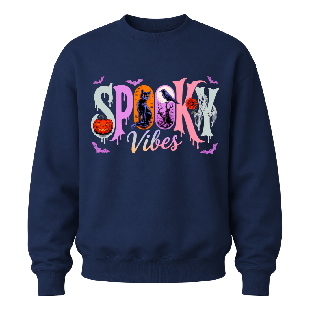 A navy blue crewneck sweatshirt featuring a colorful 'Spooky Vibes' graphic on the chest with Halloween-themed illustrations.