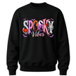 Black youth Halloween crewneck sweater featuring colourful Spooky Vibes lettering with pumpkin, black cat, raven, ghost and bats.