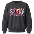 Charcoal grey kids Halloween sweatshirt with pastel Spooky Vibes graphic featuring pumpkins, bats, ghost, black cat and spooky fall artwork.
