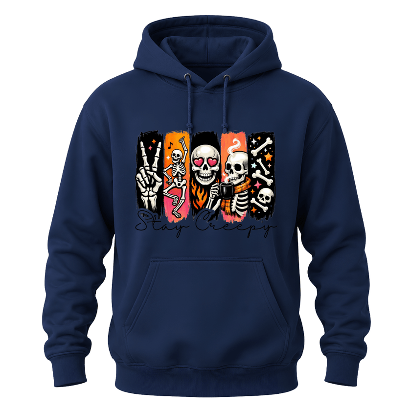 A navy blue pullover hoodie with a colorful graphic print on the chest featuring cartoon skeletons and the text 'Stay Creepy' in black script.