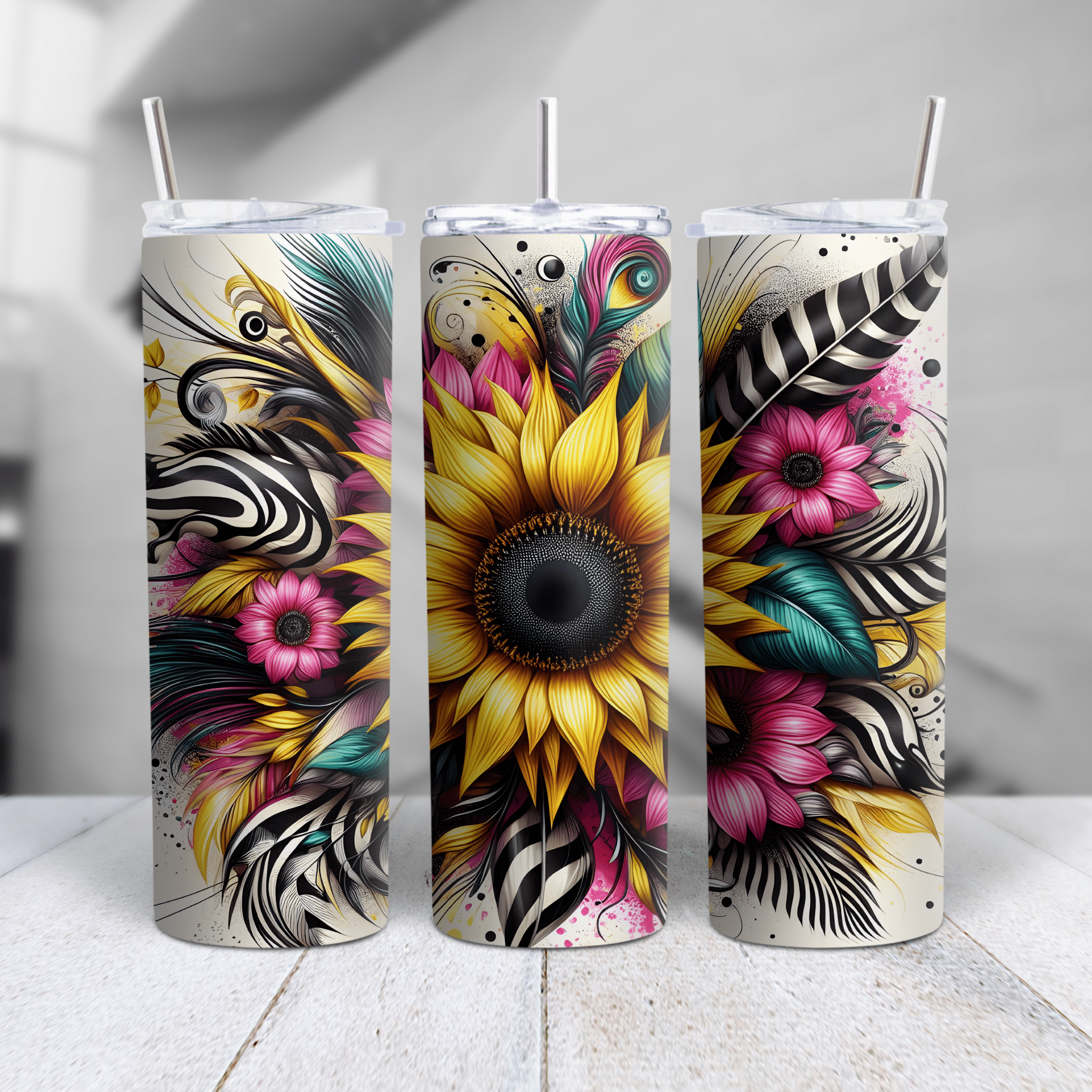 Colorful sunflower and abstract floral design stainless steel tumbler featuring vibrant petals, feathers, and bold accents.
