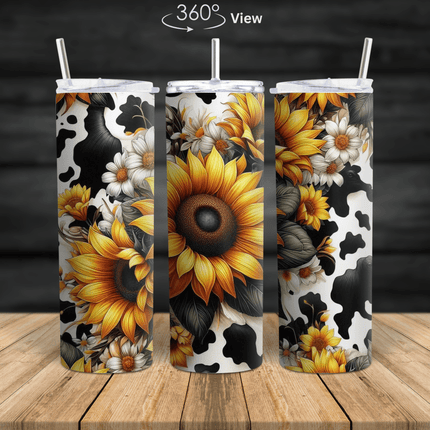 A full-wrap sunflower and cow print stainless steel tumbler featuring bright sunflowers and black-and-white cow patterns.