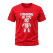 Red men’s graphic T shirt featuring white Thinking of You text and a detailed stitched voodoo doll with pins