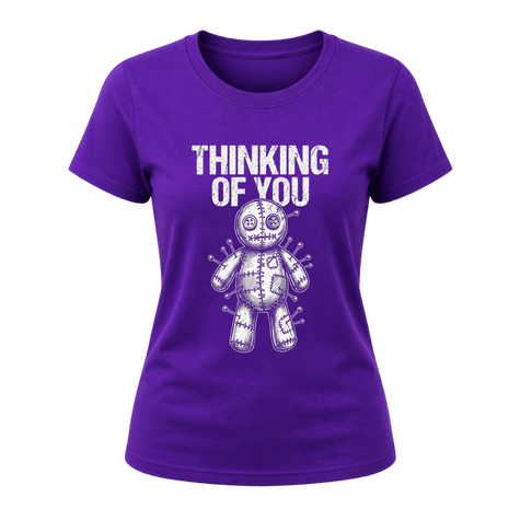 Purple women’s funny graphic T shirt featuring a Thinking of You phrase and detailed white voodoo doll artwork