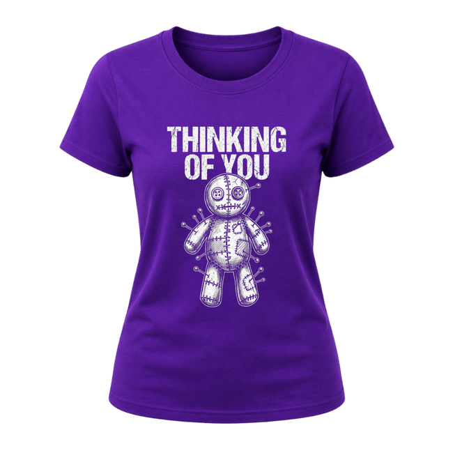 Purple women’s funny graphic T shirt featuring a Thinking of You phrase and detailed white voodoo doll artwork
