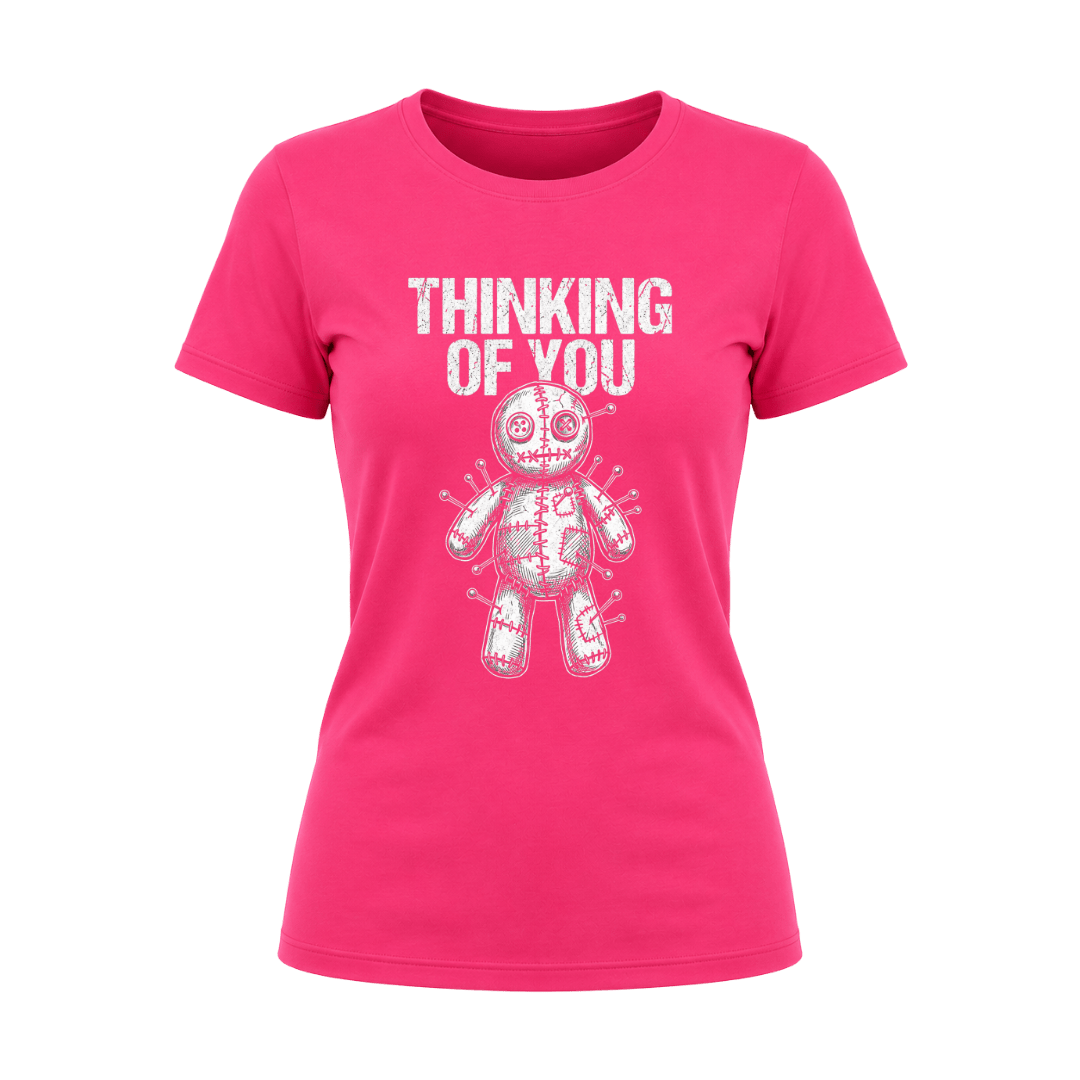 Heliconia pink women’s Thinking of You T shirt featuring a distressed white voodoo doll graphic with pins