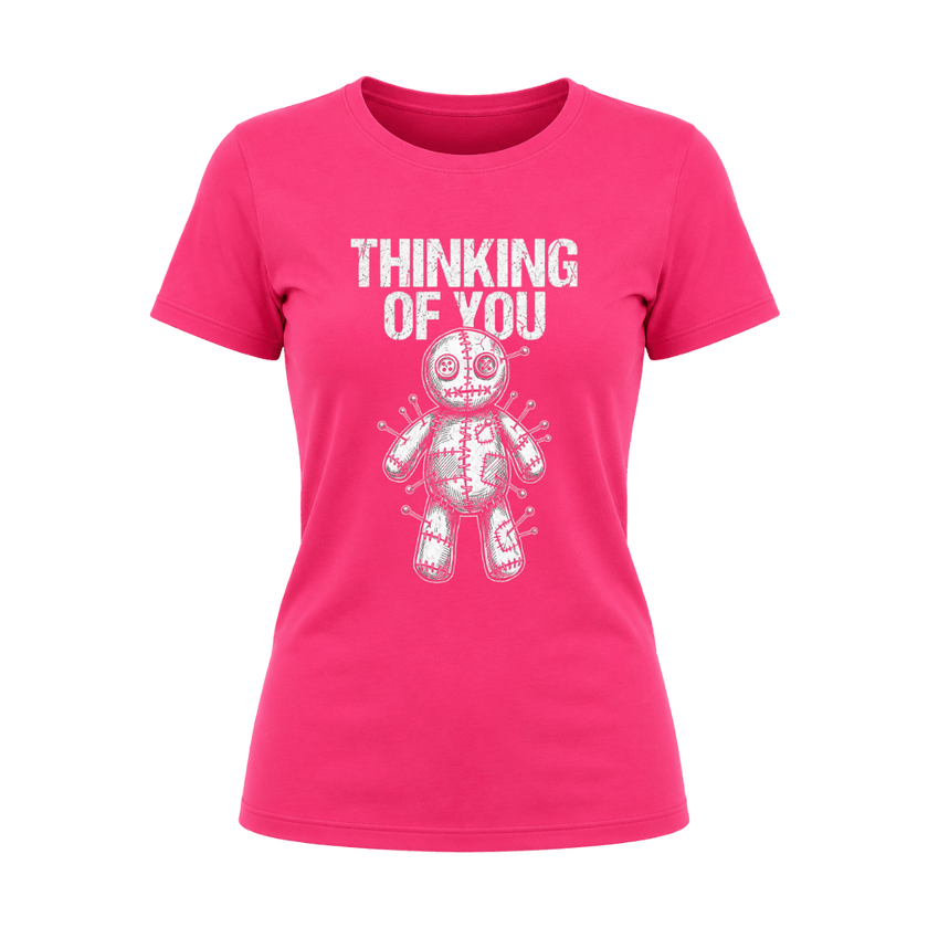 Heliconia pink women’s Thinking of You T shirt featuring a distressed white voodoo doll graphic with pins