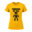 Yellow women’s funny voodoo doll T shirt featuring black Thinking of You typography and graphic artwork