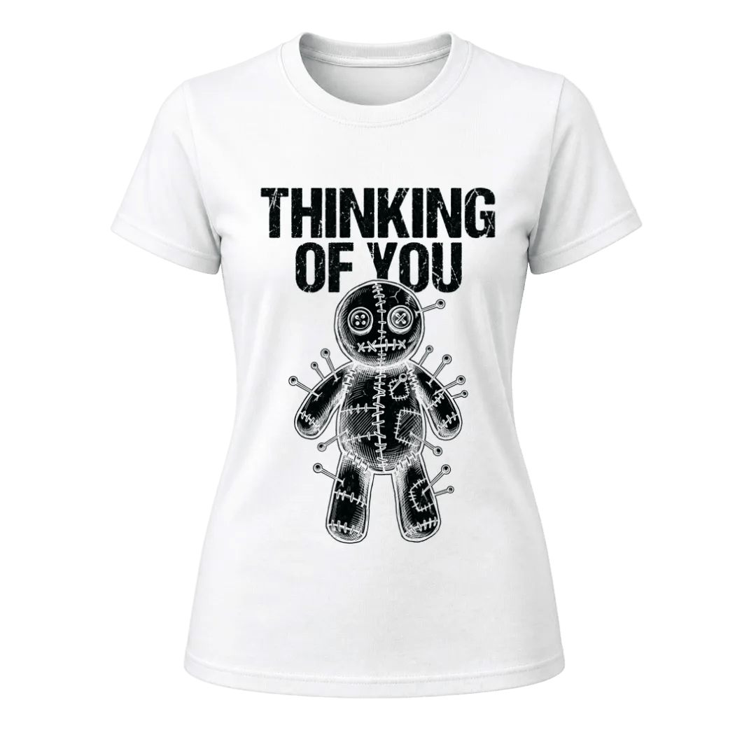 White women’s Thinking of You T shirt with distressed black lettering and detailed black voodoo doll illustration