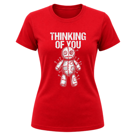 Red women’s Thinking of You graphic tee with white distressed typography and pinned voodoo doll illustration