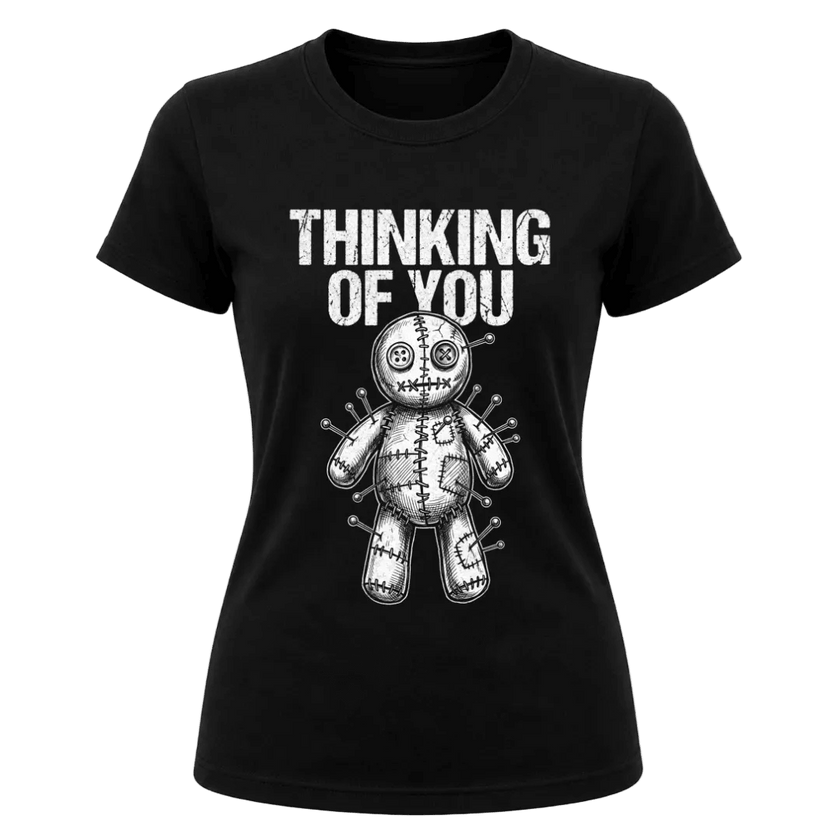 Black women’s dark humor Thinking of You graphic T shirt featuring distressed white voodoo doll artwork