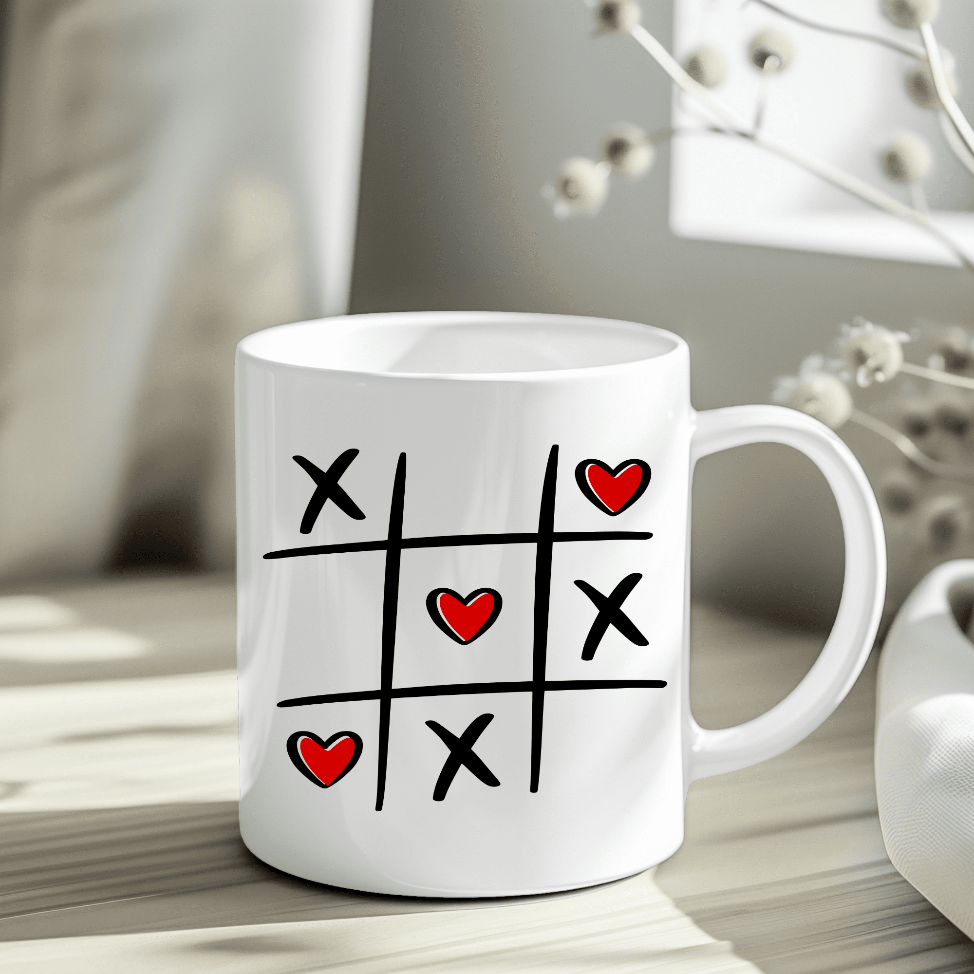 Cute love game mug showing tic tac toe board with hearts in cozy dried flower setting